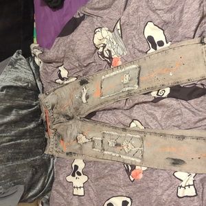 Ripped encrypted jeans